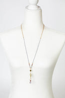 Elegant Layered Necklace displayed on a white mannequin bust, highlighting the 27-inch length and unique gemstone details.