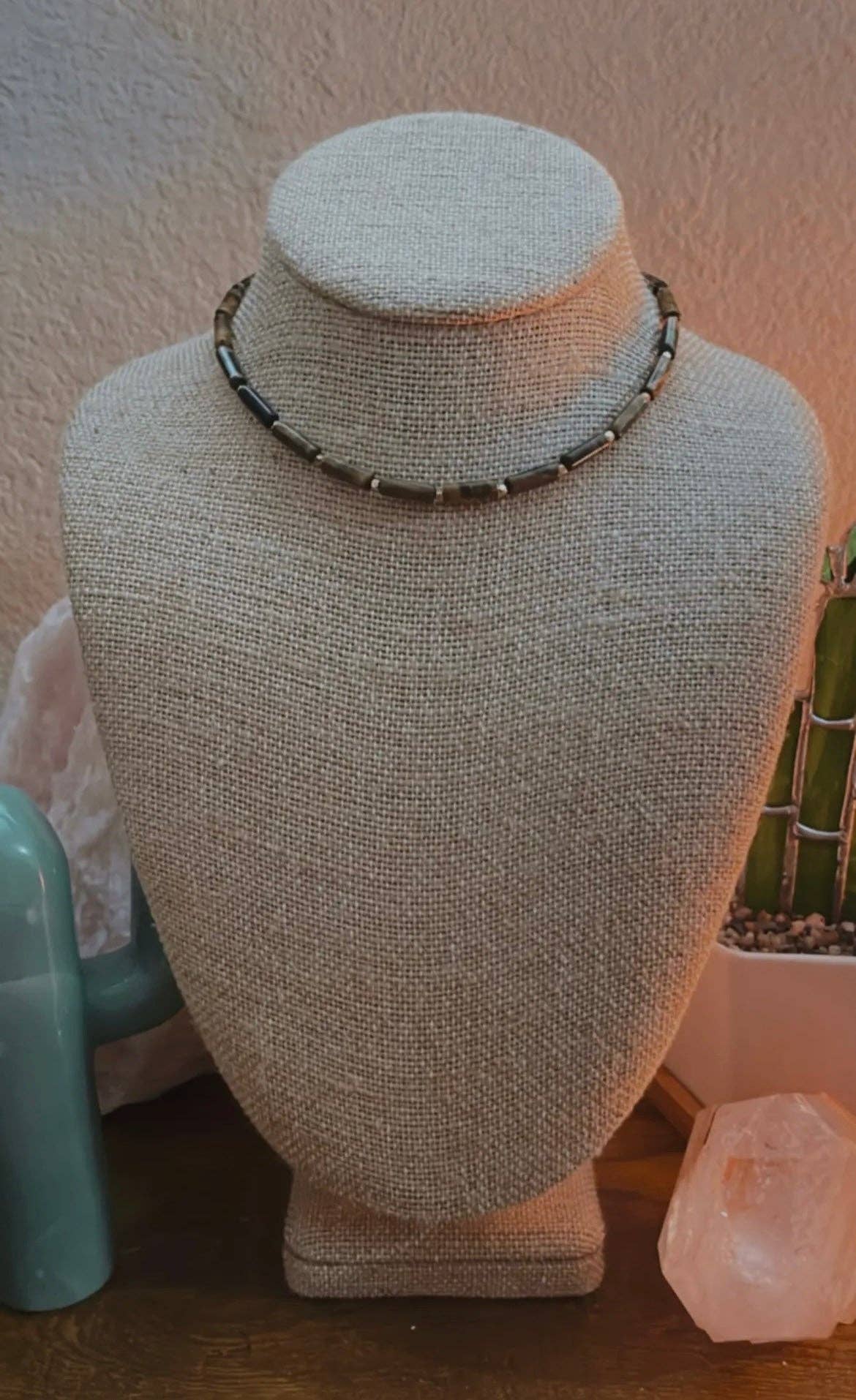 Handcrafted Tiger's Eye Choker Necklace displayed on a beige mannequin bust, showcasing the elegant Tiger's Eye tube beads and gold-plated findings, with an adjustable length of 14 to 17 inches.