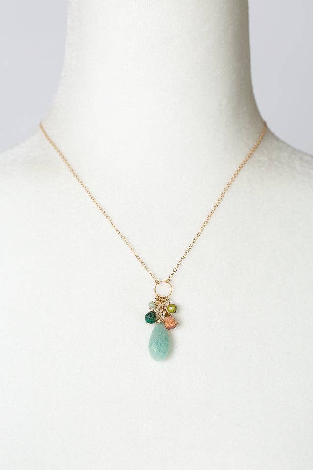 The Chrysocolla, Olive Jade & Amazonite Necklace displayed on a white fabric bust, highlighting its adjustable 16.5-18.5 inch length and elegant design.