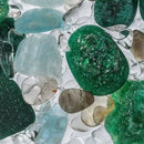 Close-up view of the Forever Young gemstones including aquamarine, aventurine, smoky quartz, and clear quartz.