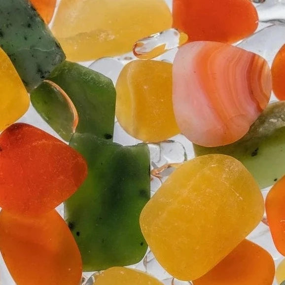 close up view of Jade, Carnelian, Orange Calcite, and Clear Quartz