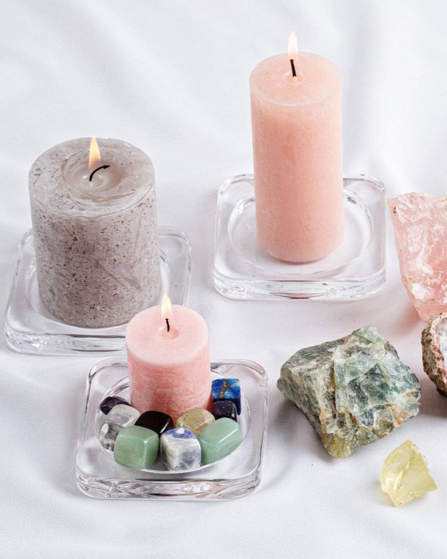 assorted candles and crystls