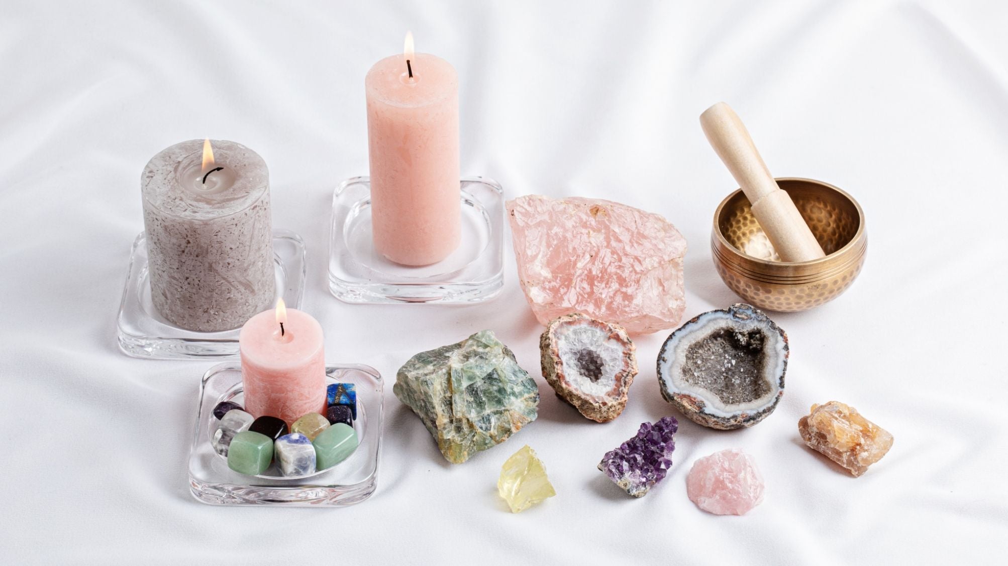 Assorted group of crystals and candles