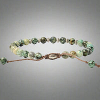 back facing african turquoise beaded bracelet with adjustable band