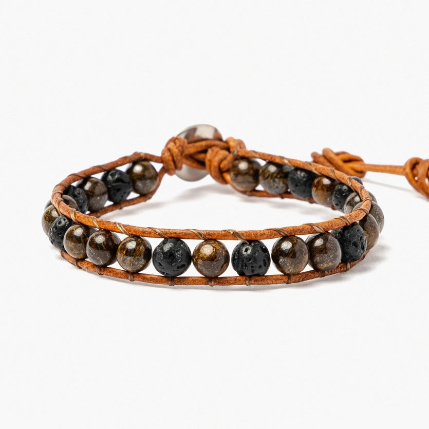 Front view of an adjustable bronzite & lava stone bracelet