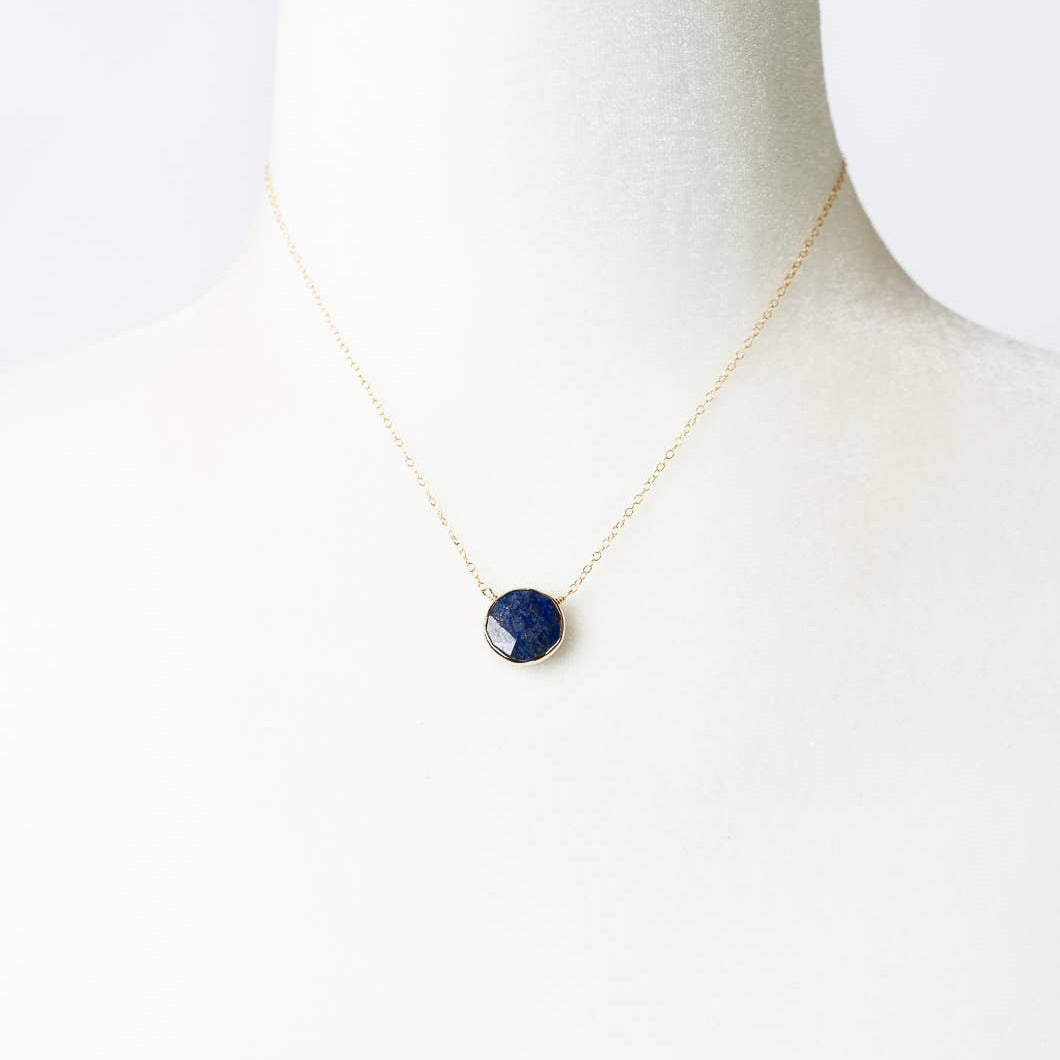 lapis necklace with a single lapis stone on a gold chain