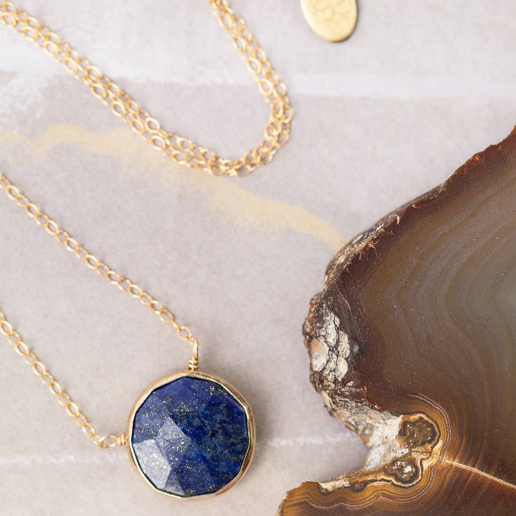 necklace with a single lapis stone and gold chain