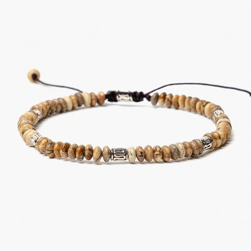 Front view of the adjustable Tibetan Jasper Bracelet, featuring small jasper beads