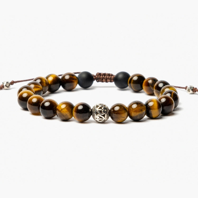 Front view of adjustable, tiger eye tibetan beaded bracelet