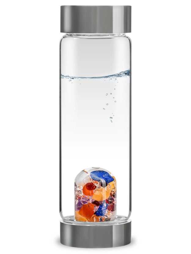 Front view of the ViA Ayurveda Gemstone Water Bottle showing the GemPod base with Milk Opal, Amethyst, Clear Quartz, Lapis Lazuli, Garnet, Carnelian, and Orange Calcite.