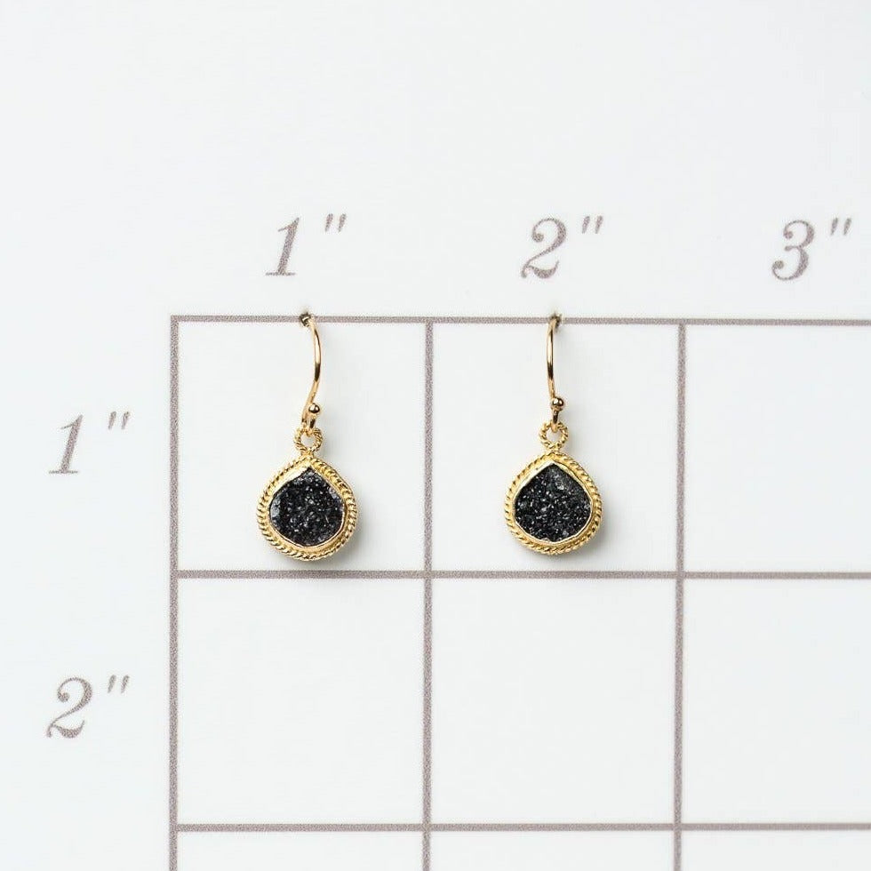 simple gold earrings with a single black druzy stone