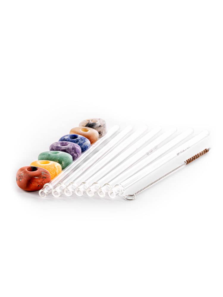 Set of glass straws with a variety of gemstones attached, including Amethyst, Rose Quartz, and others, arranged neatly in a row.