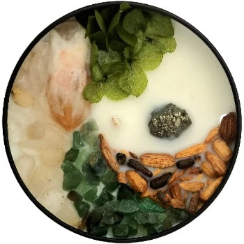 Top view of the 8oz Soy Crystal Intention Candle I Am Abundant with Citrine, Golden Rutile Quartz, Green Aventurine, and Pyrite crystals. Scented with Basil, Sage, and Mint.