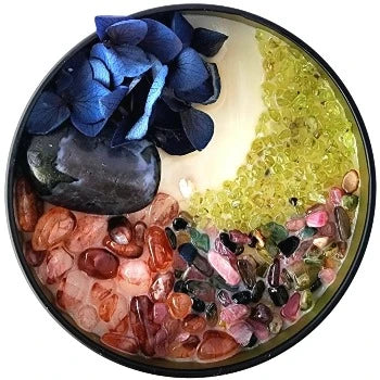 Top view of the 8oz Soy Crystal Intention Candle I Am Magic with Indigo Gabbro, Fire Quartz, Mixed Tourmaline, and Peridot crystals. Scented with Cassia and Vanilla.