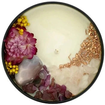 Top view of the 8oz Soy Crystal Intention Candle Lalita with Botswana Agate, Ruby, Rose Quartz crystals, and Copper. Scented with Lemongrass essential oils.