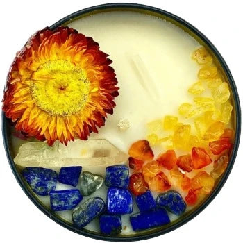 Top view of the 8oz Soy Crystal Intention Candle Saraswati with Clear Quartz, Lapis Lazuli, Carnelian, and Citrine crystals. Scented with Frankincense and Patchouli.