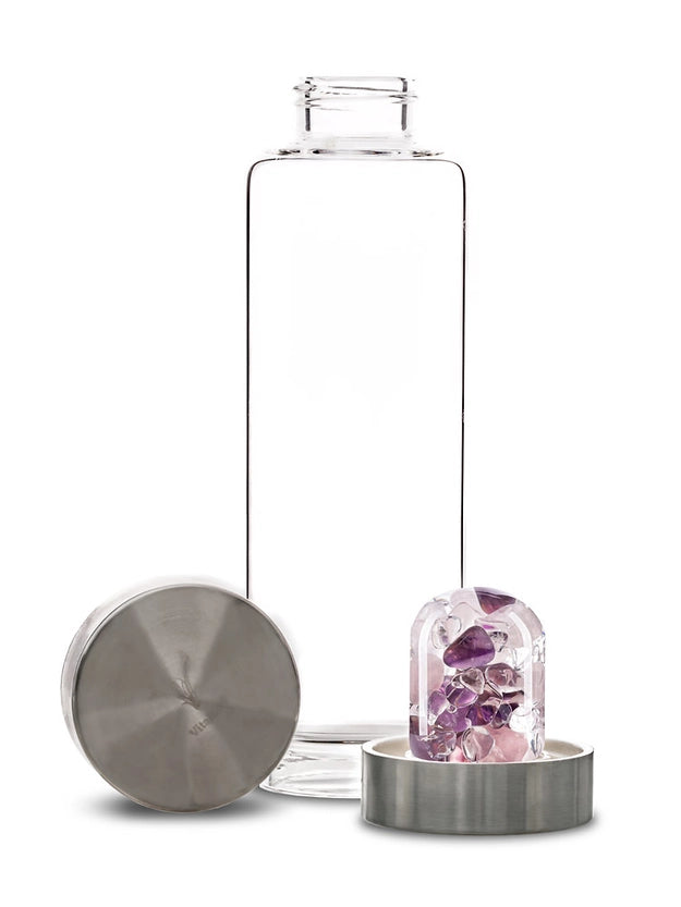 Disassembled view of the ViA Gemstone Water Bottle - Wellness, highlighting the removable GemPod base containing Amethyst, Rose Quartz, and Clear Quartz.