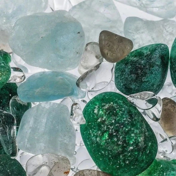 Close-up view of the Vitality gemstones including emerald and clear quartz.